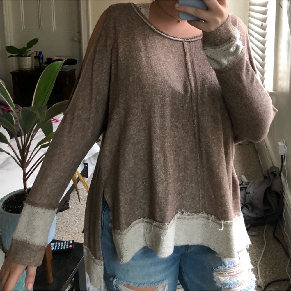 Cold shoulder distressed sweater